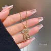 S3477 Light Luxury Dreamcatcher Netlace for Women Titanium Steel Chain Feather Hollowed Heart Niche Necklace قلادة قلادة