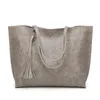Outdoor shopping bag Fashion women's bag Large capacity tassel decorative handbag
