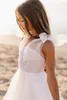 Mooie witte lovertjes tule bloemenmeisje jurken prinses pure riemen spaghetti verjaardag communie jurken zomer strand feestjurk voor tieners bc15366