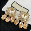 Urok klasyczny styl kolczyki lekkie luksusowe esigner krystaliczny diamentowy biżuteria z dostawą pudełka Dhyql