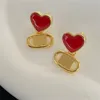 Transparent Ruby Heart Love Charm Advanced Gold Oval Dangle örhängen Lady Light Hollow Ear Stud med låda
