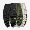 Calças masculinas Hip Hop Joggers Calça de carga Homens de harém fitas de vários bolsos do homem homem calça de rua de rua calças casuais S-5xl 230303