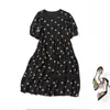 2023 Spring Round Neck Silk Floral Print Paneled Dress Black Short Sleeve Kne-Length Casual Dresses C2S123335