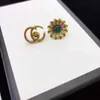 2023 Nya lyxiga högkvalitativa modesmycken för familjen Little Daisy Double Earrings Women's Net Red Mini mångsidiga örhängen