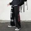 Pantaloni da uomo pantaloni goti uomini giapponesi streetwear pantaloni casual dritti maschio harajuku high street gamba larga graffiti punk hip hop pantaloni 230306