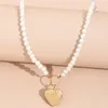 Подвесные ожерелья женщины ювелирные украшения ретро -свитер цепь персикового сердца ожерелье сердца