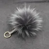 Keychains Big 15 cm Fluffy Real Fur Ball Pomm Pomm Natural Pompom Correa de cuero Cadena de llaves Costilería para mujeres Charm2023
