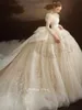 Vestidos de novia de vestidos de baile de dubai manga larga de cristal transparente con cuello de cristal con cuentas de novia aplicadas de encaje diseñador de lentejuelas vestido de novias