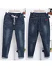Jeans femininos Mulheres verão Autumn Baggy cintura jeans Coreia Calças rasgadas fêmea 100 kg de harém solto pano 230306