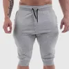 Mäns shorts Men sommarträning shorts dragskojgoggare 3/4 knälängd bomullssport som kör homme Bermuda casual korta svettbyxor 230306