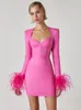 Casual jurken aankomst vrouwen winter sexy lange mouw veer veer roze zwarte mini bandage jurk elegante avondclub feestjurk 230303