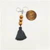 Keychains Lanyards Party Favor Wooden Bead Keychain With Round Wood Chips And Cotton Tassel Pendant Key Ring Custom Sublimation Lo Dhc28