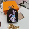 Letra de luxo Carta de carteira -chave Designer Koki Rabbit desenho animado Mini Bolsas de moeda de mochila Bolsas de embreagem de zíper de animais com zíper para a carteira de armazenamento com pingentes de bolsa de chaveiro