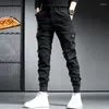 Mäns jeans modedesigner Män löst fit blixtlås med en ficka casual lastbyxor hombre streetwear hiphop joggar övergripande