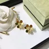 Pendientes traseros Top Brand Clip 3 Gold Tone Micro Inlay Zircon CZ Flor delicada para mujer Joyería de boda