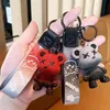 Designer tênis de couro de couro de silicone chameleon urso criativo cartoon ketoon keychains feminina requintada saco pingente casal