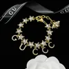 Top designer jewelry family's temperament suit letters full diamond bracelet five-pointed star earrings