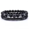 STRAND 2PCS/SET CHARM UNISEX Natuurlijke magnetische energie steen Multi-laags Bead Bracelet Unieke legering Mat Black kralen Koperpangle