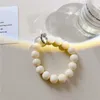 Correas para teléfono celular Encantos Correa linda coreana del color del caramelo para 14 cuentas de pulsera Cordón colgante Mochila para teléfono móvil Cordón colgante Pequeño fresco