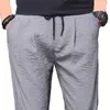 Pantaloni da uomo Autunno Pantaloni lunghi da uomo Autunno Mesh Fresco elastico Sport Jogger Jogging Tuta traspirante Pantaloni aria condizionata 2022 Inizio inverno Z0306