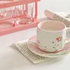 Xícara de café rosa conjuntos