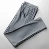 Men's Pants Ice silk breathable hole men's casual trousers beam feet pants Slim wild nine points sports fitness Fishing pants Cycling shorts Z0306