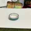 20% off all items 2023 New Luxury High Quality Fashion Jewelry for The ancient enamel is decorated with bright green interlocking double woven piping ring