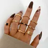 Band Rings Vintage Gold Color Hollow Out Black Zircon Conjunto para mulheres Punk Butterfly Heart Knuckle Jóias AA230306