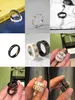 Top designer jewelry and White Ceramic Black Steel Stone Couple Ring Planet Fried Dough Twists Naked Gifts to Girlfriend