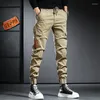 Jeans masculino Designer de moda Men solto Fit Zipper Pocket Casual Casual