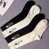 Women Triangle Letter Knee Sock Strumps Special Letter Long Socks Black White 3 Styles