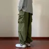 Męskie spodnie moda mężczyźni Pochodnik Spodnie Ładunki szerokie noga proste workowate Ogryjskie spodnie Big Pocket Hip Hop Casual Bottoms Black 230307