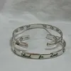 2023 nouveaux bijoux de mode de haute qualité de luxe pour double oeil coeur oiseau fleur et phrase amour série Bracelet