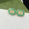 Pendientes de mujer de color turquesa, dije ovalado regordete con borde dorado, joyería elegante y generosa con temperamento