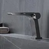 Rubinetti per lavandino del bagno Rubinetto nero Aspetto del pianoforte Design Maniglia singola Bacino d'acqua a cascata fredda e doppio controllo