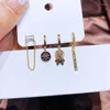 Hoop oorbellen Migga 4pcs Cz Stone Lion Star Pendant Set voor vrouwen Goudkleur Verplatte sieraden