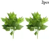 Fleurs décoratives 2pcs Plante artificielle tige 7 brins fausses verte pour le bureau à domicile Décoration de mariage du jardin de fête à domicile