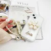 Luxury Pearl Cell Phone Cases Wrist band Chain Protective Back Covers Mobile Phone Holder Flower Transparent Apple CASE For IPhone 14 13 Pro max plus 12 11 Anti-drop