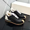 Zapatos casuales negros para hombres y mujeres Flow Runner en nylon y gamuza Zapatilla con cordones con una parte superior suave y suela de ondas de goma color miel zapatos de cuero