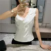 Chemisiers pour femmes Sexy Lady Perle Travail Sans Manches Bloues Femme Perle Tops Femme Irregualr Chemises Bureau