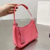 Bolso Hobo de moda de alta calidad Bolso de diseñador de lujo Correa de hombro de nylon Bolso de mano Monedero Colgante de metal Bolsos de hombros Mini billetera Bolsos de mujer