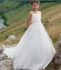 Flower Girls sukienki na wesela klejnotowe szyi koronkowe aplikacje zamiatanie kula pociągiem urodziny Dziewczyna dziewczyna suknia konkursowa