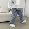 Męskie dżinsy hip hop dżinsy Mężczyźni workowate spodnie towarowe swobodne duże kieszonkowe spodnie dżins