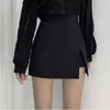 Jupes Mini jupes femmes irrégulière solide fente latérale extensible Style coréen à la mode Chic OL taille haute femme bas printemps automne 230308