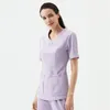 Infermieristica medica Pantaloni a due pezzi Abiti da lavoro Lavaggio a mano Abbigliamento Chirurgico a maniche corte Orale Dentale Salone di bellezza Uniforme da lavoro Personalizzazione delle donne