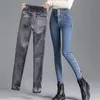 Jeans pour femmes hiver épais polaire taille haute chaud bouton maigre Vintage Jeans Casual Plus velours élasticité coréenne mode crayon pantalon femmes 230308