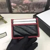 Kvalitet svart röd äkta läder kvinnors nyckel plånbok med låda luxurys designers plånbok handväska kreditkortshållare 573812248J