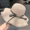 Wide Brim Hats European And American Ladies Wind Fashion Love Bow Curling Dome Big Eaves Beach Vacation Spring / Summer Shade Straw Hat Elob