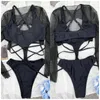 Женские купальники Qinjoyer Black One Piece Swimsuit Женщины с длинными рукавами с высокой талией сексуально вырезанный сетчатый костюм для купальника монокини