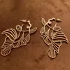 Dangle Earrings Retro Hollow Out Koi Metal Wind誇張魚の形の創造性の性格